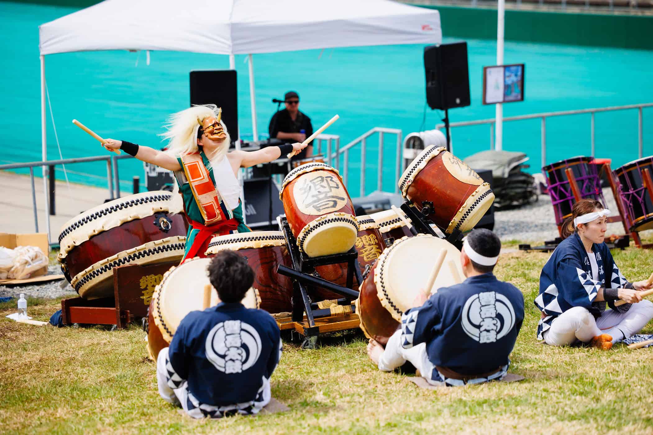 Event performers playing the drums during the Hakuba Half Marathon event.